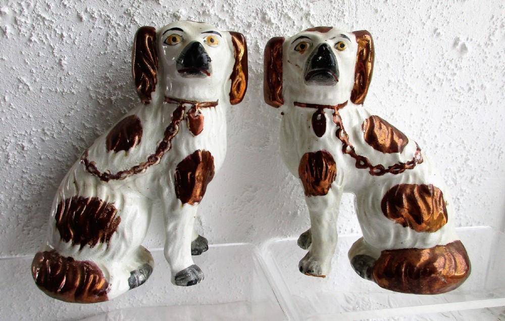 pair of antique english victorian staffordshire pottery comforter spaniels