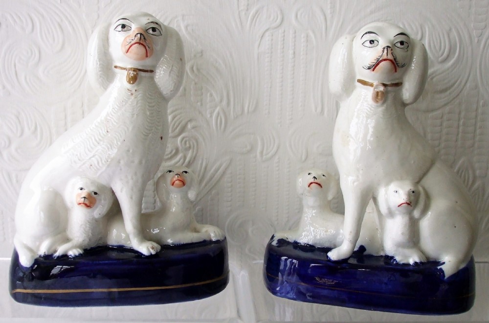 pair of antique english victorian staffordshire pottery poodles with pups